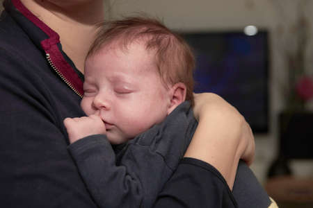 mother is playing with baby at homeの写真素材