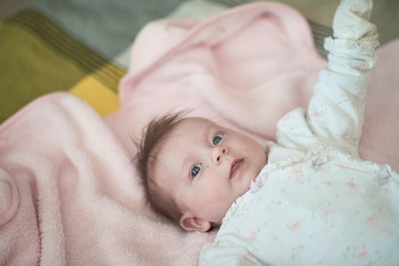 happy newborn little baby smilling