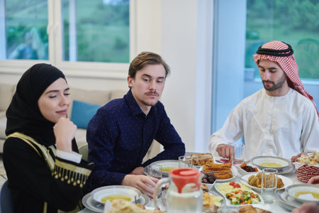 Muslim family having iftar together during Ramadanの写真素材