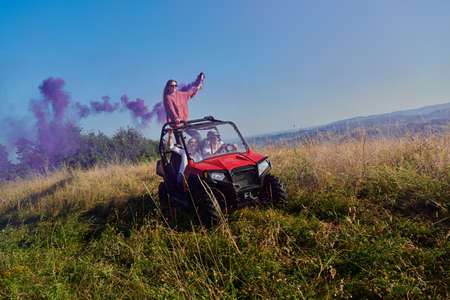 colorful torches while driving a off road buggy carの写真素材