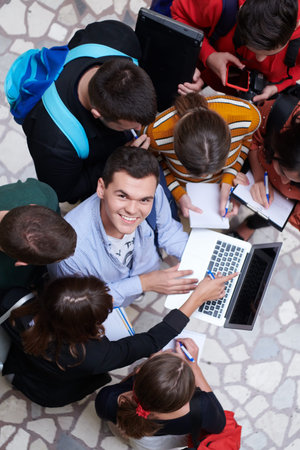 students using modern technology for school project