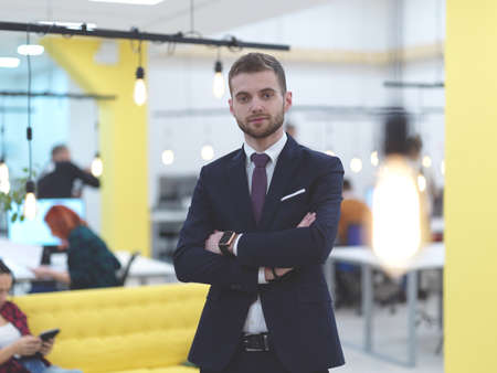 businessman portrait in modern coworking open space officeの写真素材