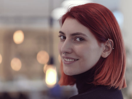 redhead business woman portrait in creative modern coworking startup open space office