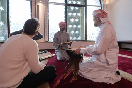 muslim people in mosque reading quran together