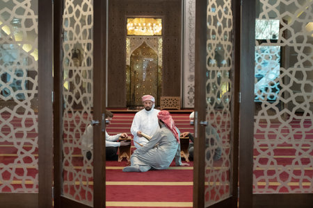 muslim people in mosque reading quran together