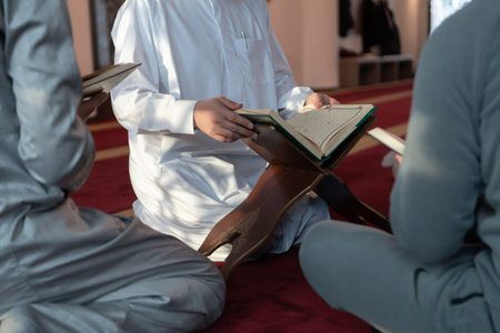 muslim people in mosque reading quran together