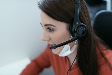 call center operator in medical mask