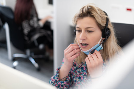 call center operator in medical mask