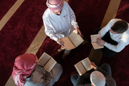 muslim people in mosque reading quran together