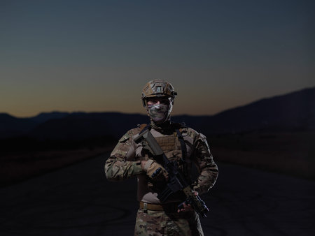 soldier with full combat gear in night missionの写真素材