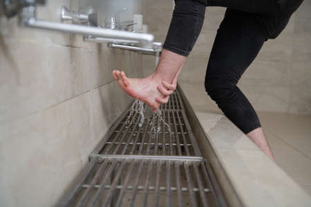 A Muslim takes ablution for prayer. Islamic religious riteの写真素材