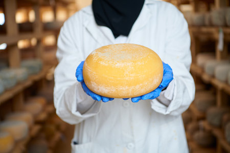 African black muslim business woman in local cheese production company