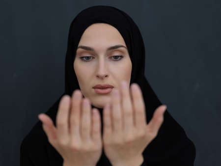 Portrait of young Muslim woman making duaの写真素材