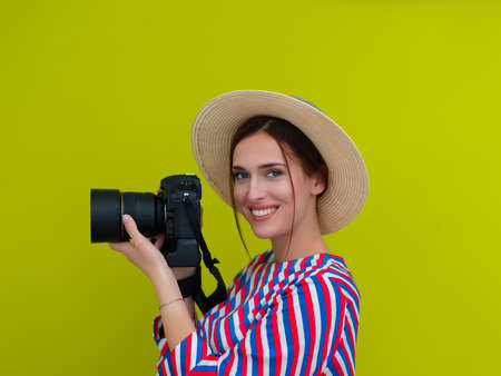 Portrait of beautiful female photographer close upの写真素材