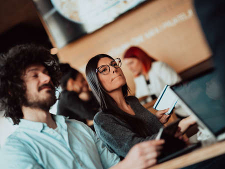 a businessman and a businesswoman at a business meeting, arranging new jobs. business conceptの写真素材