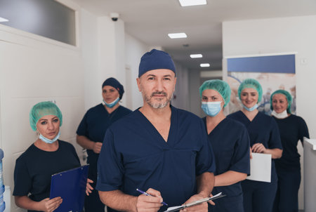 Orthopedic doctor working together with his multiethnic team