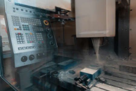industrial metal work machining process by cutting tool on CNC latheの写真素材