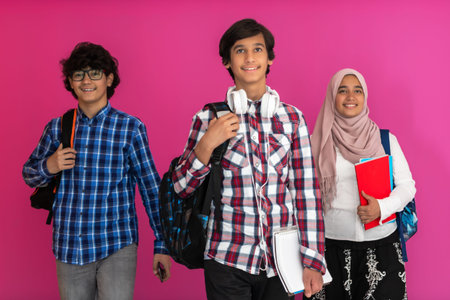 A group of Arab teenagers, a student team walking forward into the future and back to school the...