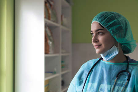 portrait of the female surgeon after an operation on animal hospital clinic surgery roomの写真素材