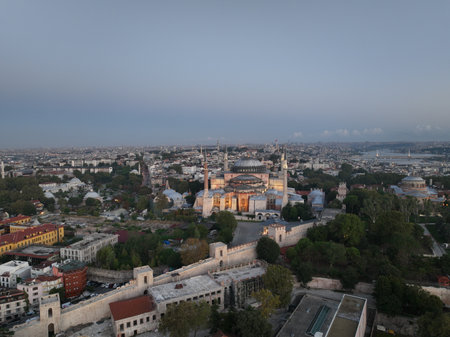 Istanbul, Turkey. Sultanahmet with the Blue Mosque and the Hagia Sophia with a Golden Horn on the background at sunrise. Cinematic Aerial view.の写真素材