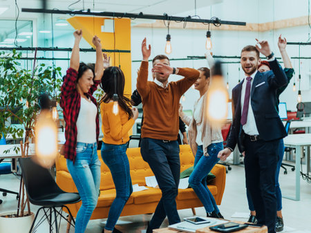 Group of business people throwing paper in air at modern startup office, team success and job done conceptの写真素材