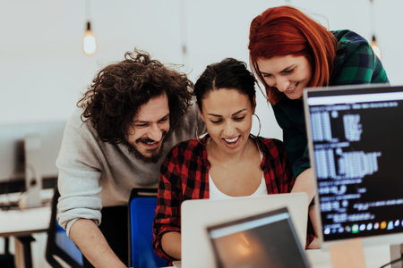 Multiethnic group of employees working in a marketing company. A group of colleagues is working on a...