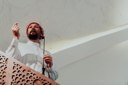 Muslims arabic Imam has a speech on friday afternoon prayer in mosque. Muslims have gathered for the...