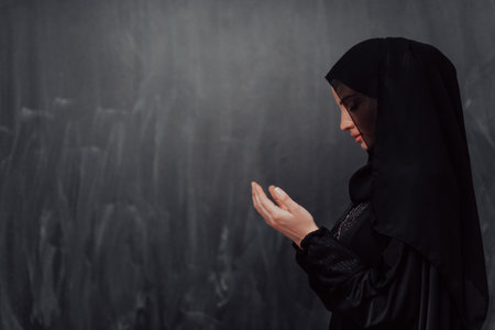 Portrait of young Muslim woman making duaの写真素材