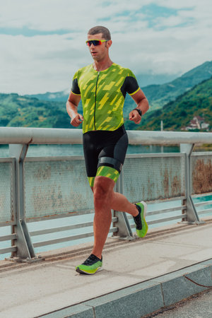 An athlete running a marathon and preparing for his competition. Photo of a marathon runner running...