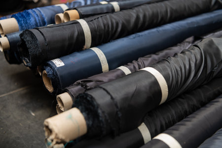 Interior of an industrial warehouse with fabric rolls samples. Small business textile colorful warehouse.の写真素材