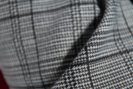 Collection of fashionable fabrics. Samples of different natural fabrics for sewing a fashion collection of clothes. Large selection of fabrics in the store or tailor warehouse.の写真素材