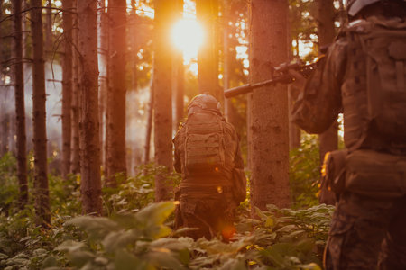 A group of modern warfare soldiers is fighting a war in dangerous remote forest areas. A group of...