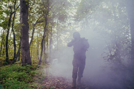 Battle of the military in the war. Military troops in the smokeの写真素材