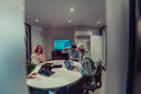 A diverse group of businessmen collaborates and tests a new virtual reality technology, wearing...