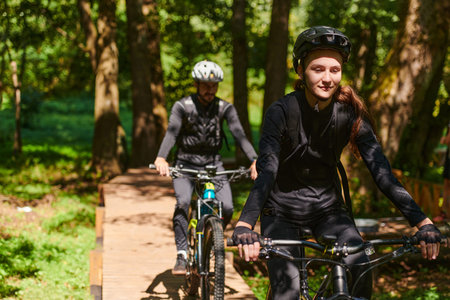A blissful couple, adorned in professional cycling gear, enjoys a romantic bicycle ride through a...