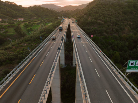 Aerial view on highway bridge in the Italian mountainsの写真素材