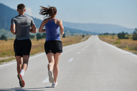 Dynamic Duo: Fitness-Ready Couple Embraces Confidence and Preparation for Upcoming Marathons