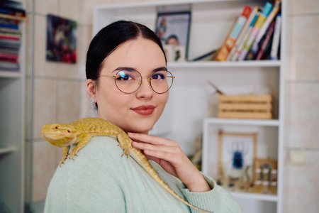 Beautiful Woman Posing with Her Adorable Bearded Dragon Pets