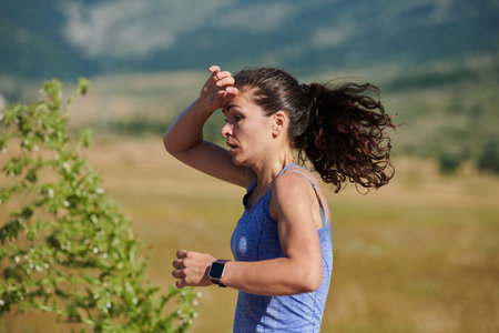 Solo Stride: Determined Athlete Woman Embarks on Fitness Journey for Marathon Preparation.