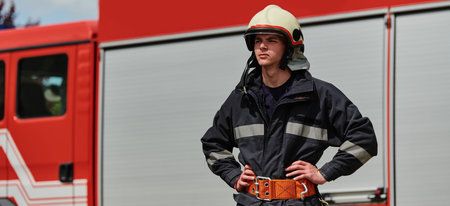 Professional Firefighter Suits Up in Full Gear for Duty