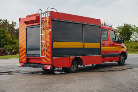 A state-of-the-art firetruck, equipped with advanced rescue technology, stands ready with its...