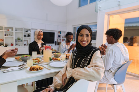 In the sacred month of Ramadan, a diverse Muslim family comes together in spiritual unity, fervently...