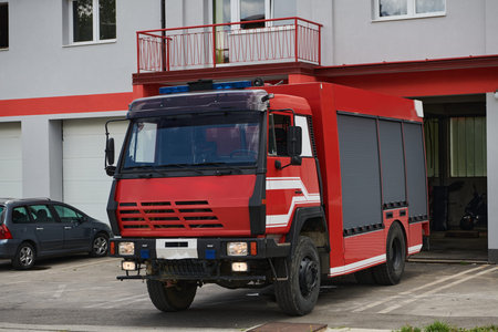 A state-of-the-art firetruck, equipped with advanced rescue technology, stands ready with its...