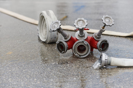 Coiled Fire Hose Ready for Action on the Ground