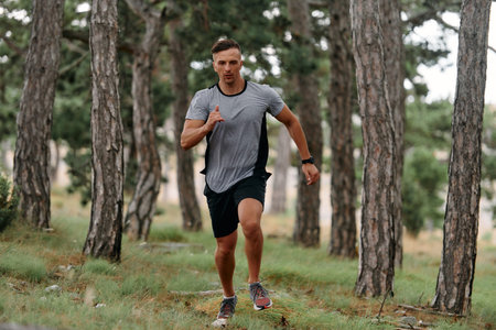 Determined Man Conquering Forest Obstacles with Grit and Speed