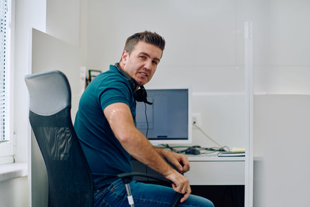 Close Up Portrait of a Customer Support Representative in a Call Center Environment.