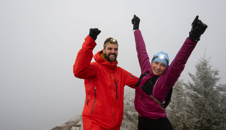 Runner couple having fun after trail cross-country trail running training