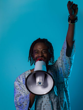 In a powerful and symbolic image, an African American man wears traditional clothing, passionately...