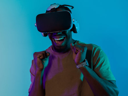 African American man immerses himself in a thrilling horror gaming experience using VR glasses,...