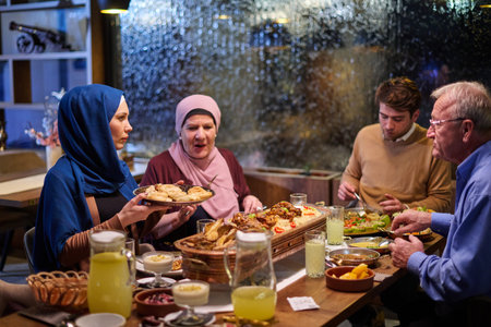Muslim family enjoys iftar together in a restaurant during Ramadan surrounded by festive decorations